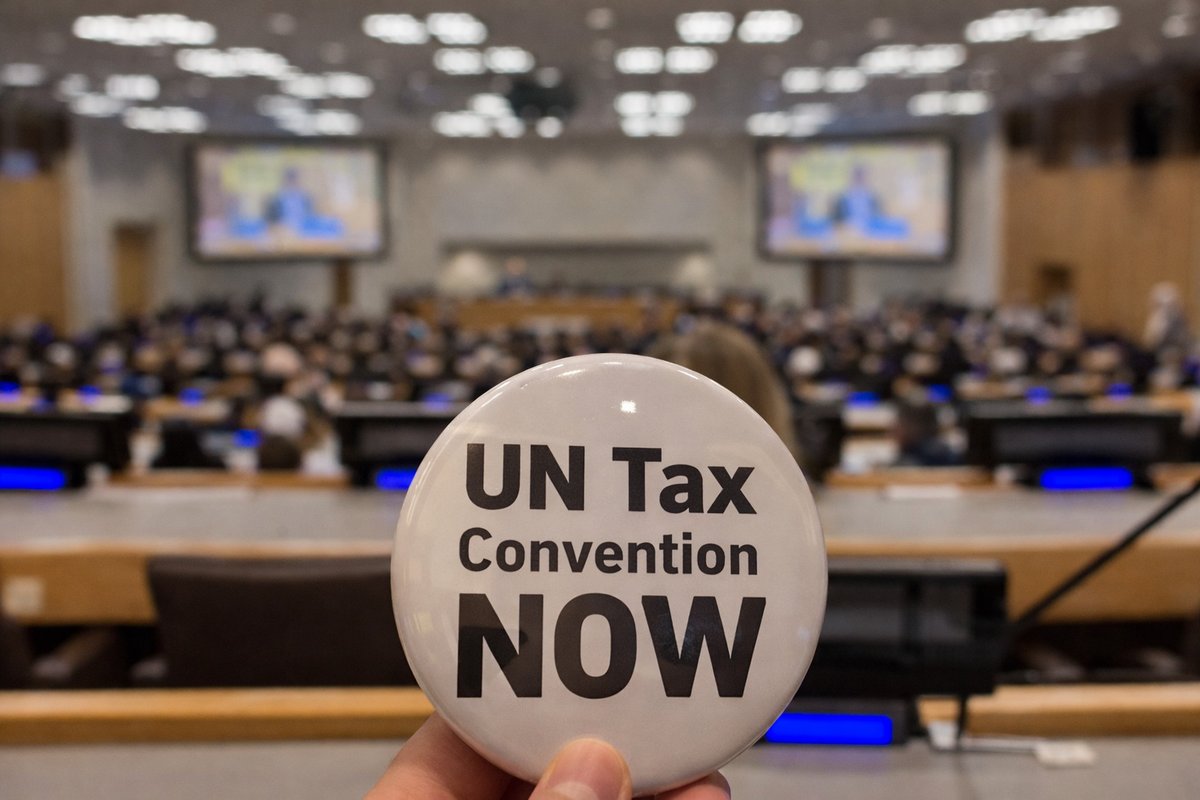 Global taxation and climate liability for fossil fuel firms